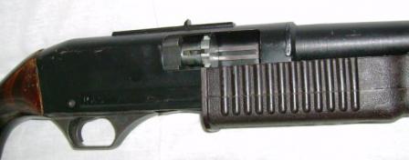 KS-23 weapon, right side close up with bolt partially retracted to showits rotary locking head.